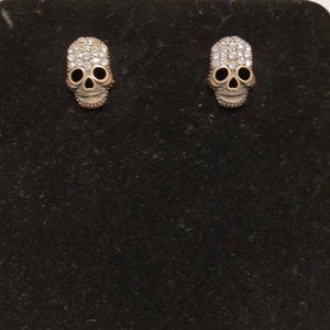 Smiling Skull Earrings. Bronze colored with crystals.